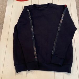 Ultra core men’s sweat shirt in size L with black & red stripes on sleeves.